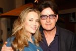 Charlie Sheen divorţează pentru a treia oară.