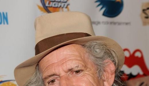 Chitaristul de la The Rolling Stones  a lovit în cap un jurnalist francez.