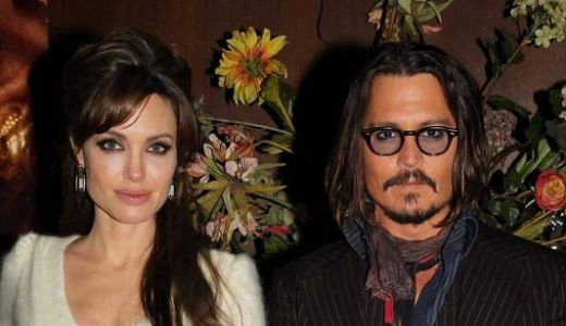 Johnny Depp, muşcat de câinele cuplului Angelina Jolie-Brad Pitt.