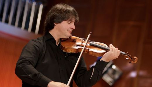 Povestea românului care cântă cu un Stradivarius în cea mai importantă orchestră a lumii.