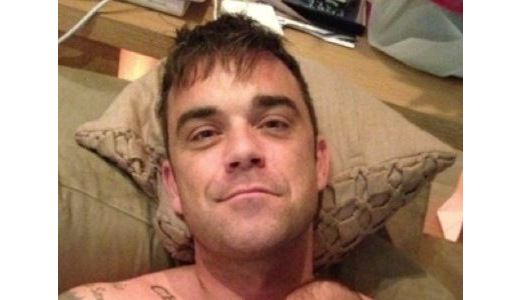 VEZI prima fotografie cu Robbie Williams şi fiica sa.