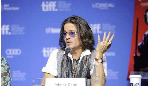 Johnny Depp s-a logodit cu Amber Heard.